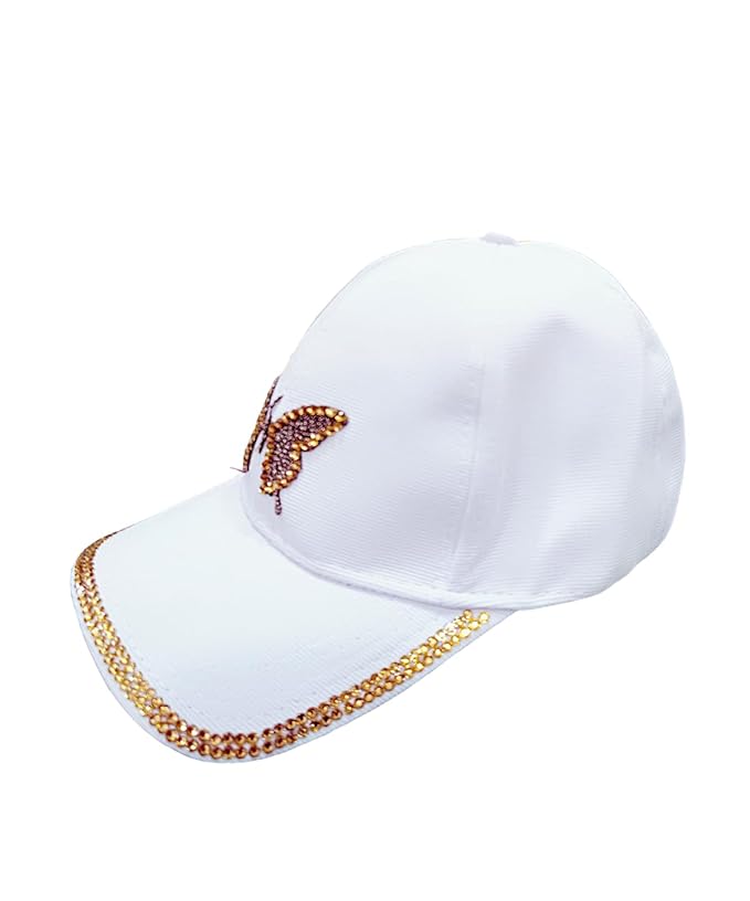 The image shows a stylish white cap for women featuring a decorative butterfly design with gold and brown rhinestones on the front. The cap's brim is adorned with a gold rhinestone trim, adding a touch of elegance.