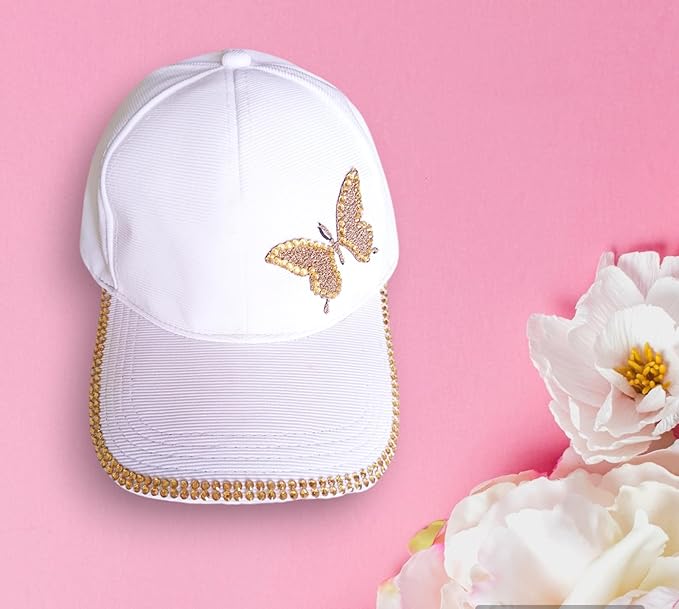 Stylish white cap with a golden butterfly, ideal for women caps online, kids hats, baby bibs online, and affordable gifts online.