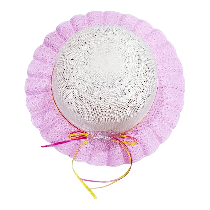 The image shows a white crocheted hat with a pink lace brim, featuring a pink and yellow ribbon with a decorative bow, set against a plain white background.